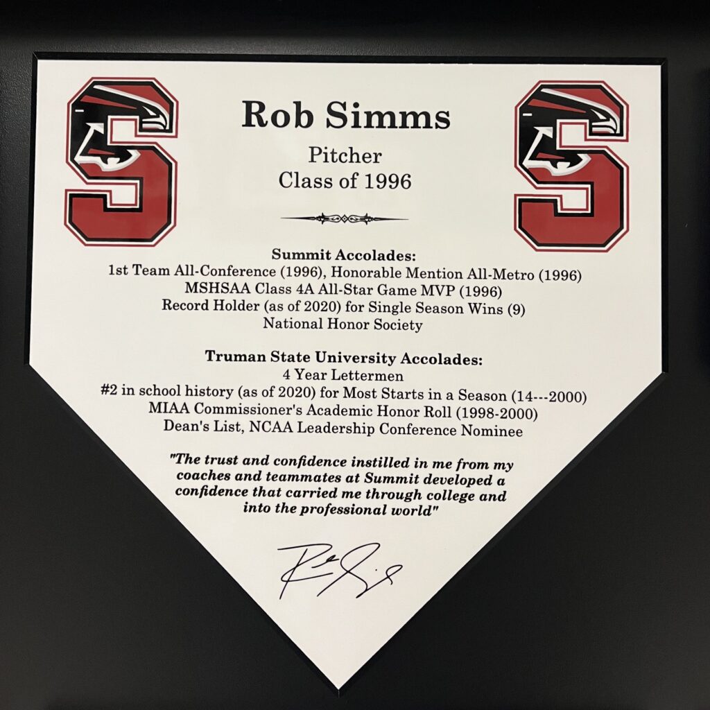 A framed commemorative plaque for Rob Simms, South Carolina pitcher, Class of 1996.